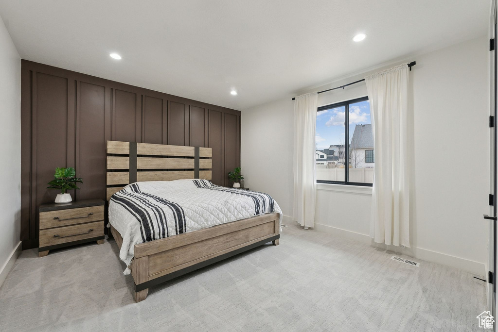 Bedroom with recessed lighting, baseboards, and light colored carpet