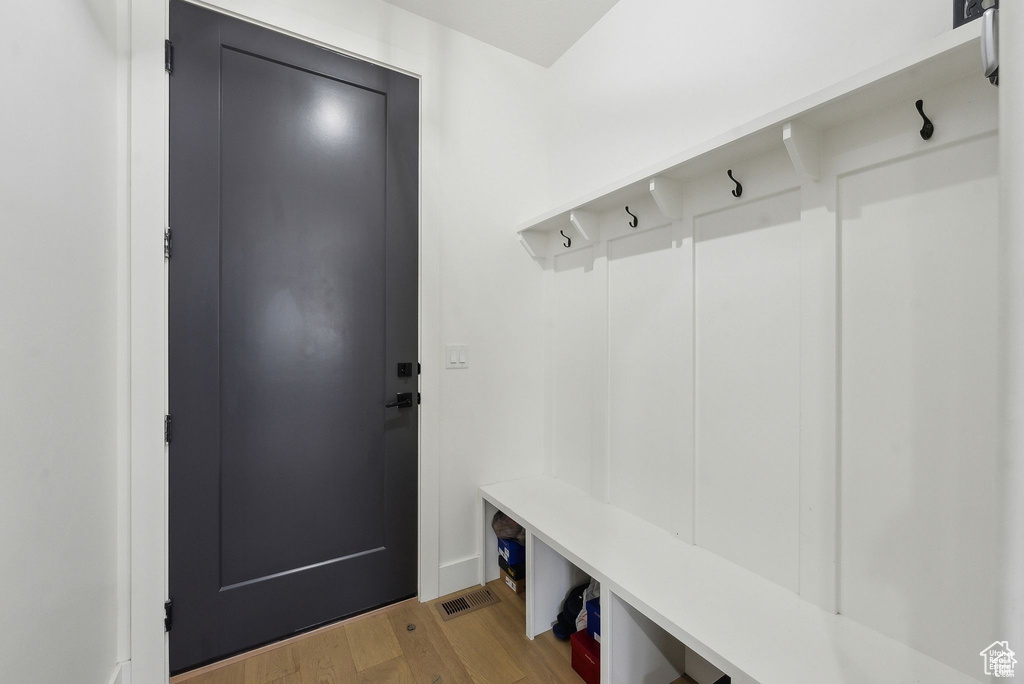 Mudroom with light wood-type flooring