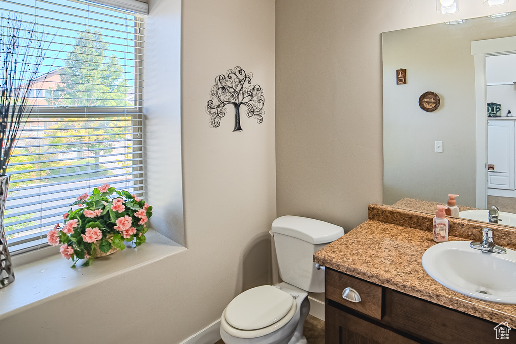 Half bath with toilet and vanity