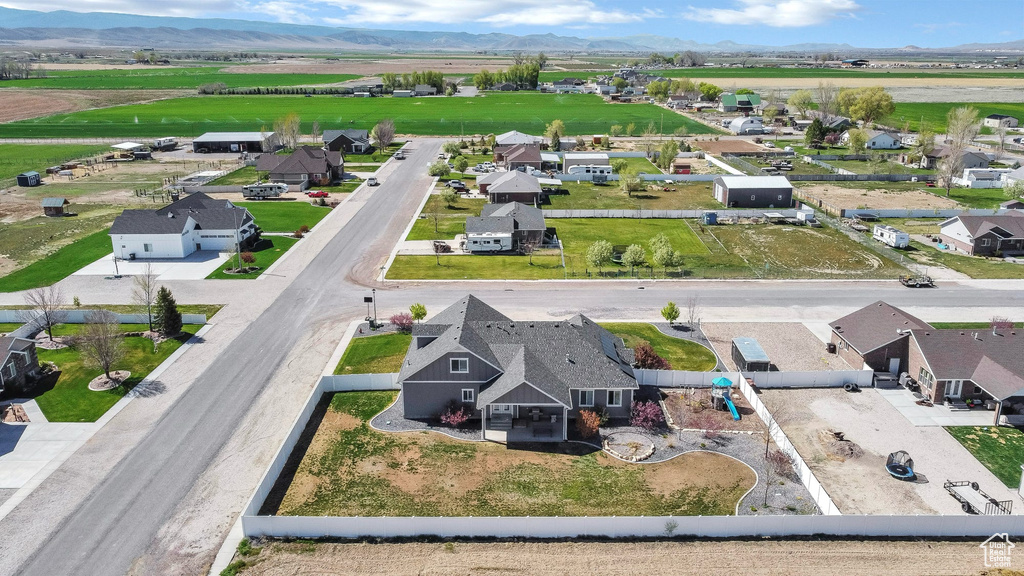 Aerial view of residential area with a mountainous background
