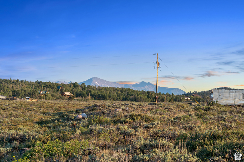 View of mountain feature with a rural view