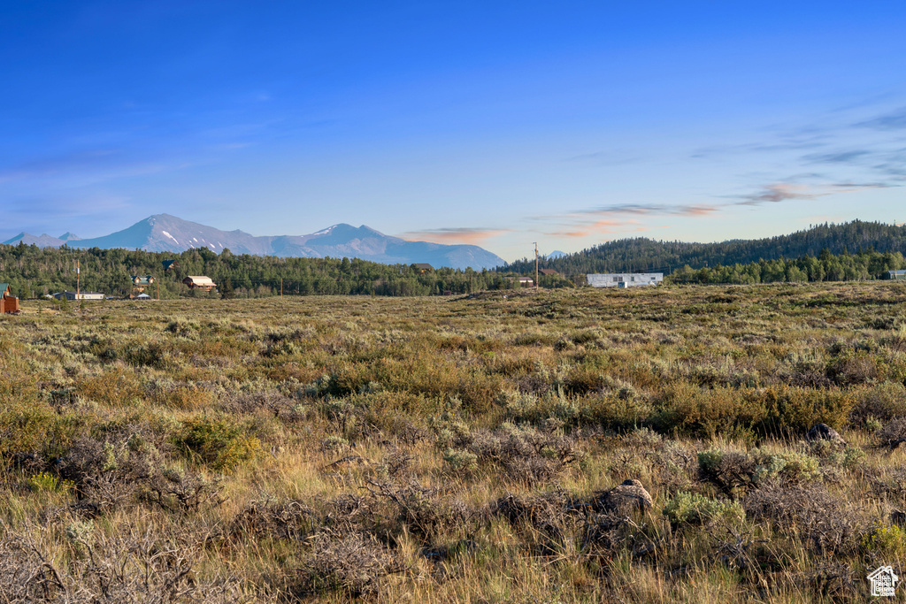 Property view of mountains featuring a rural view