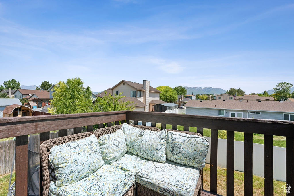 Balcony with a residential view and a mountain view