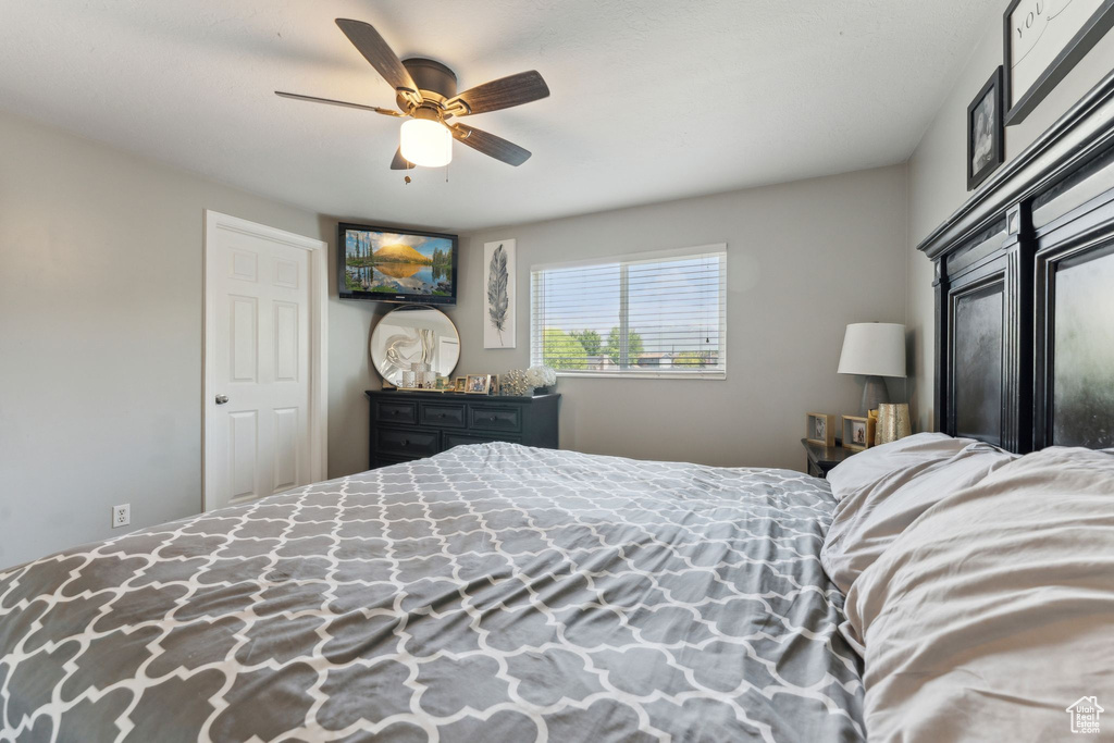 Bedroom featuring a ceiling fan