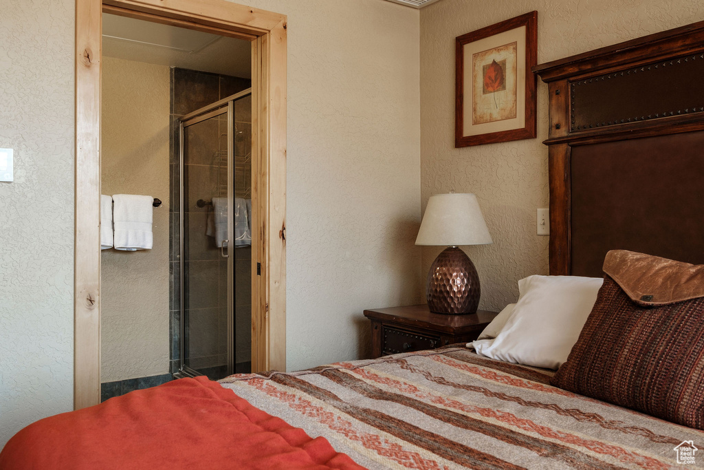 Bedroom with a textured wall