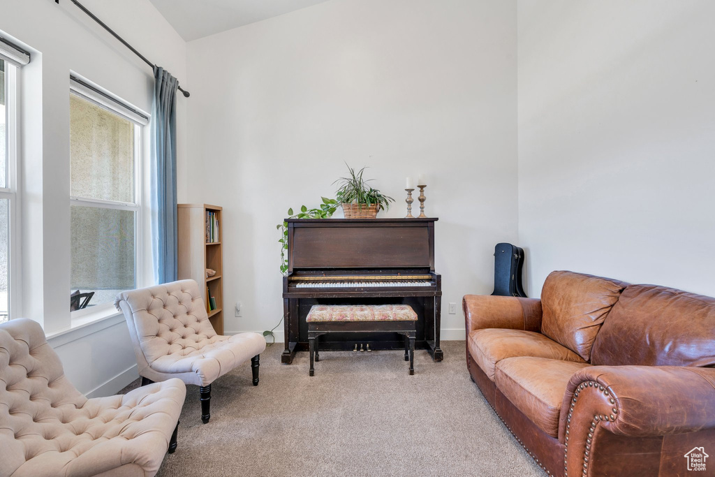 Sitting room with carpet flooring and baseboards