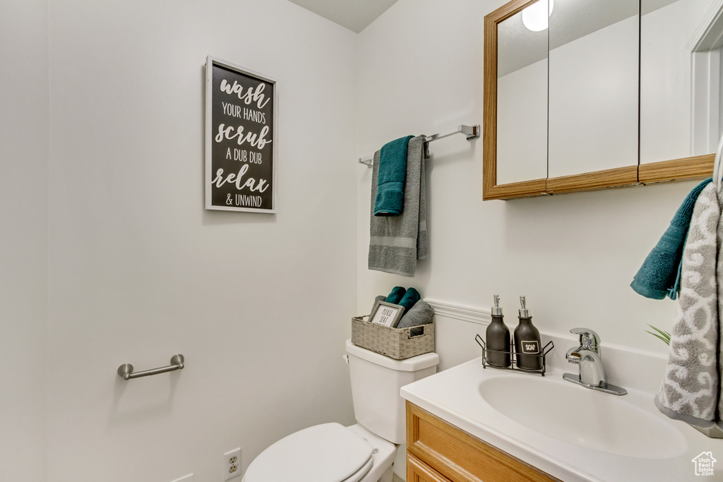 Bathroom with vanity and toilet