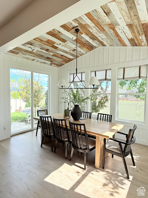 Dining space with light wood-style floors