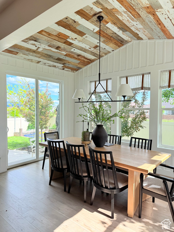 Dining space featuring plenty of natural light and light wood-style flooring