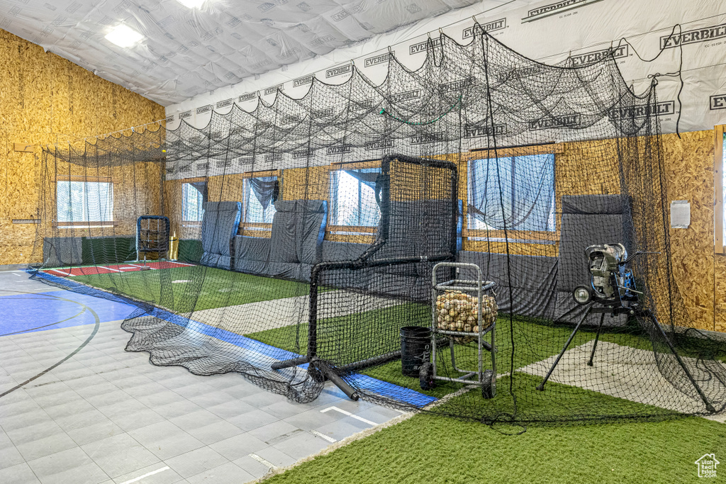 View of home\\\\\\\'s community featuring an area for soccer and vaulted ceiling