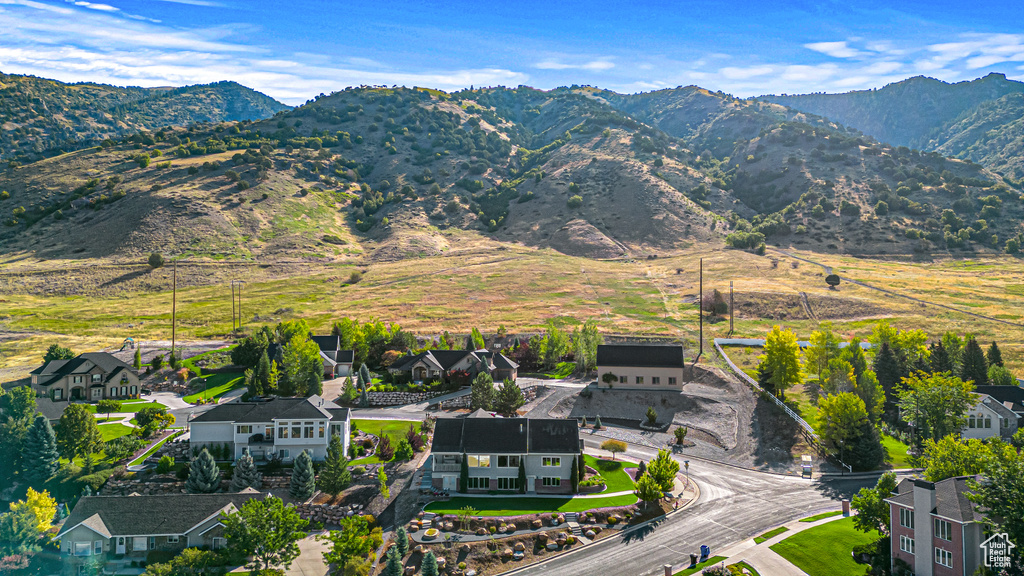 View of mountain backdrop with nearby suburban area