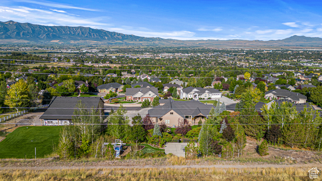 Aerial view of residential area with a mountainous background