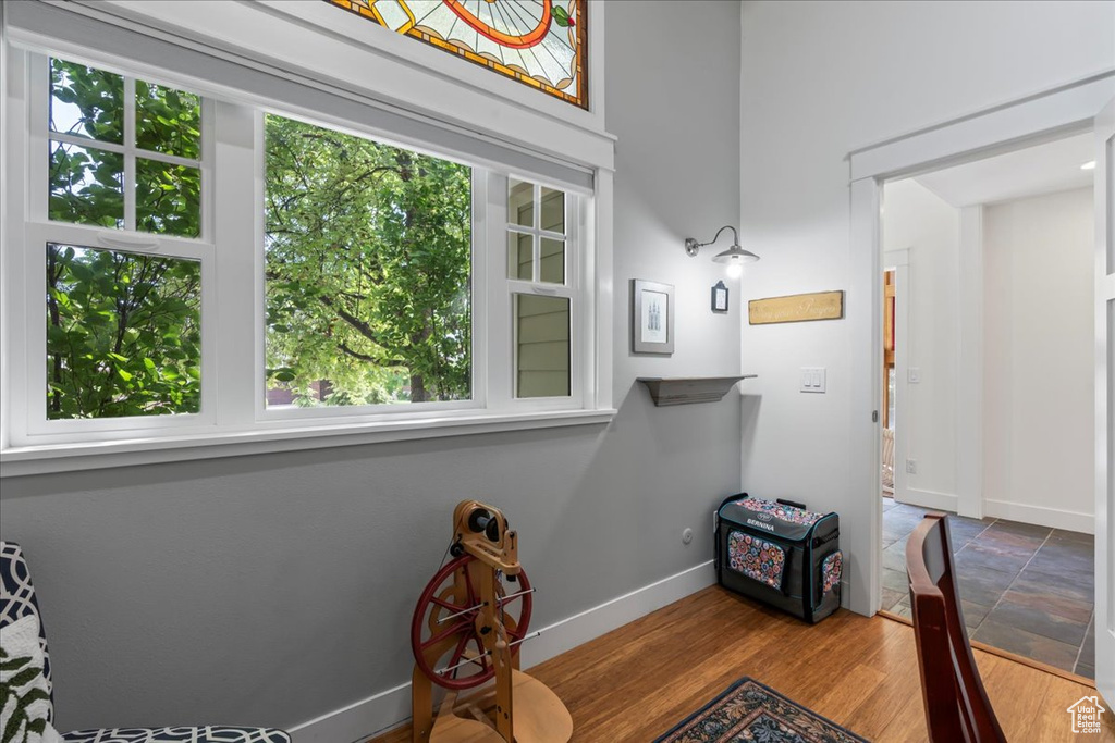 Office area featuring baseboards and wood finished floors
