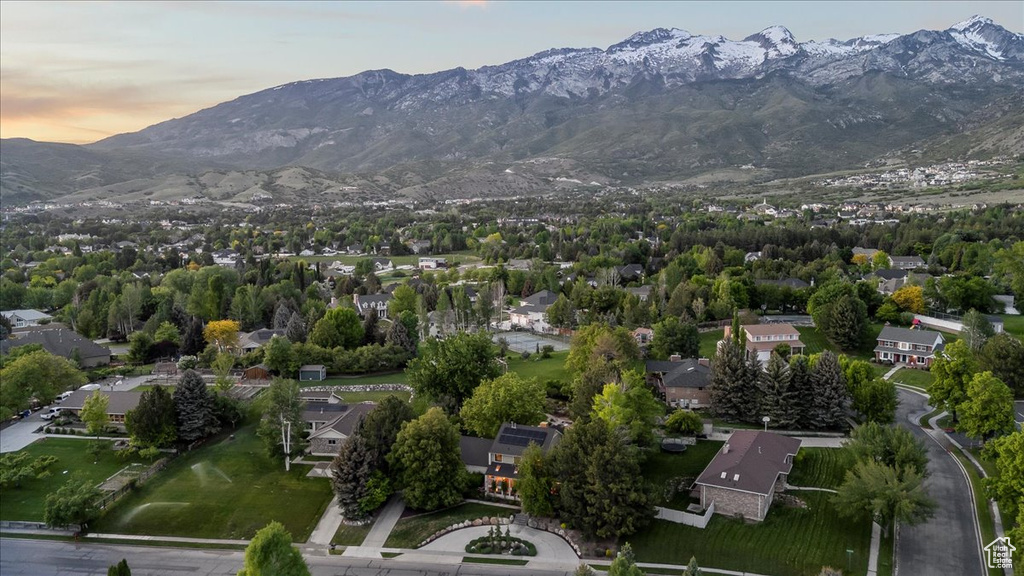 Aerial view at dusk of a mountain view and a residential view