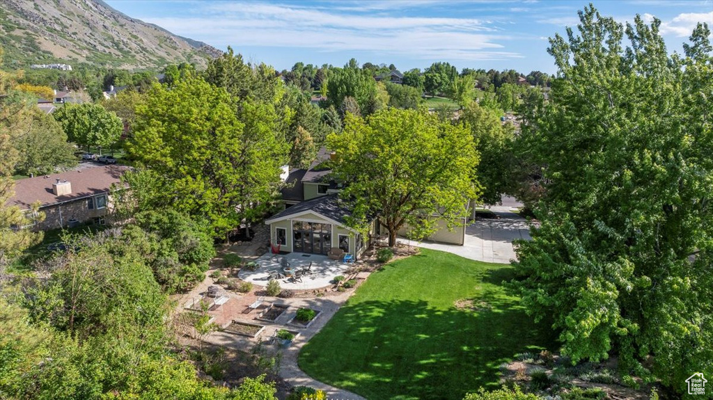 View of subject property with a mountain backdrop