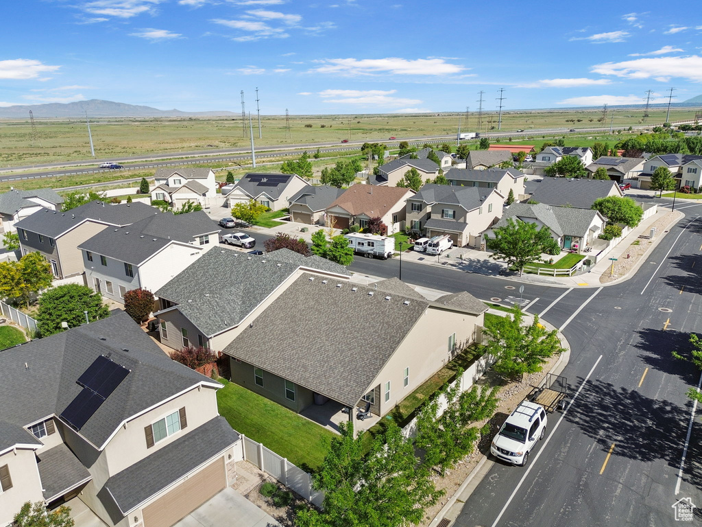 Aerial perspective of suburban area featuring mountains
