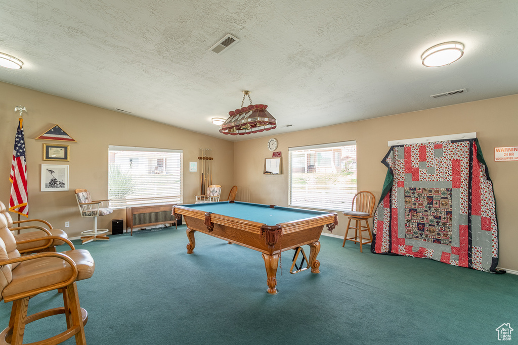Rec room featuring billiards, carpet flooring, baseboards, and a textured ceiling