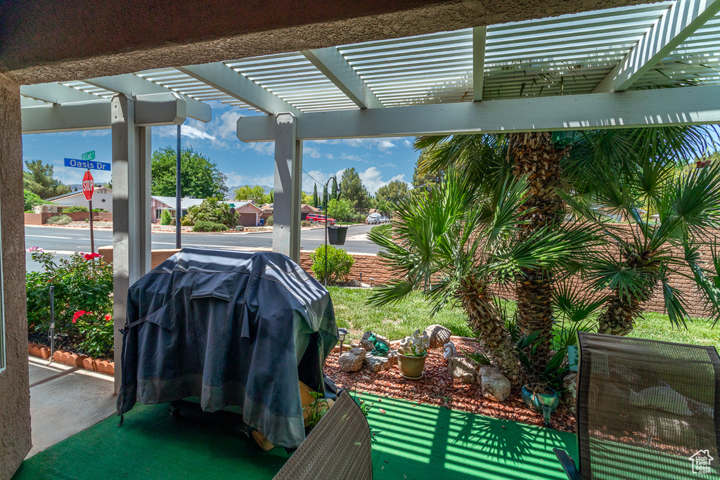 View of patio / terrace featuring a pergola and a grill