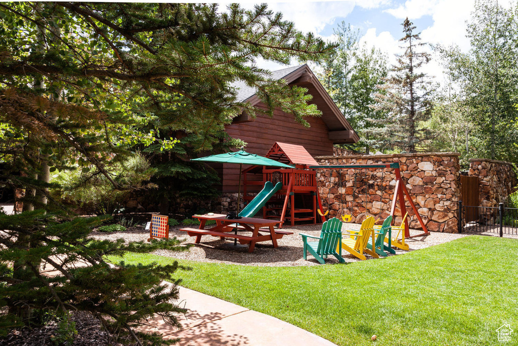 View of yard with a playground