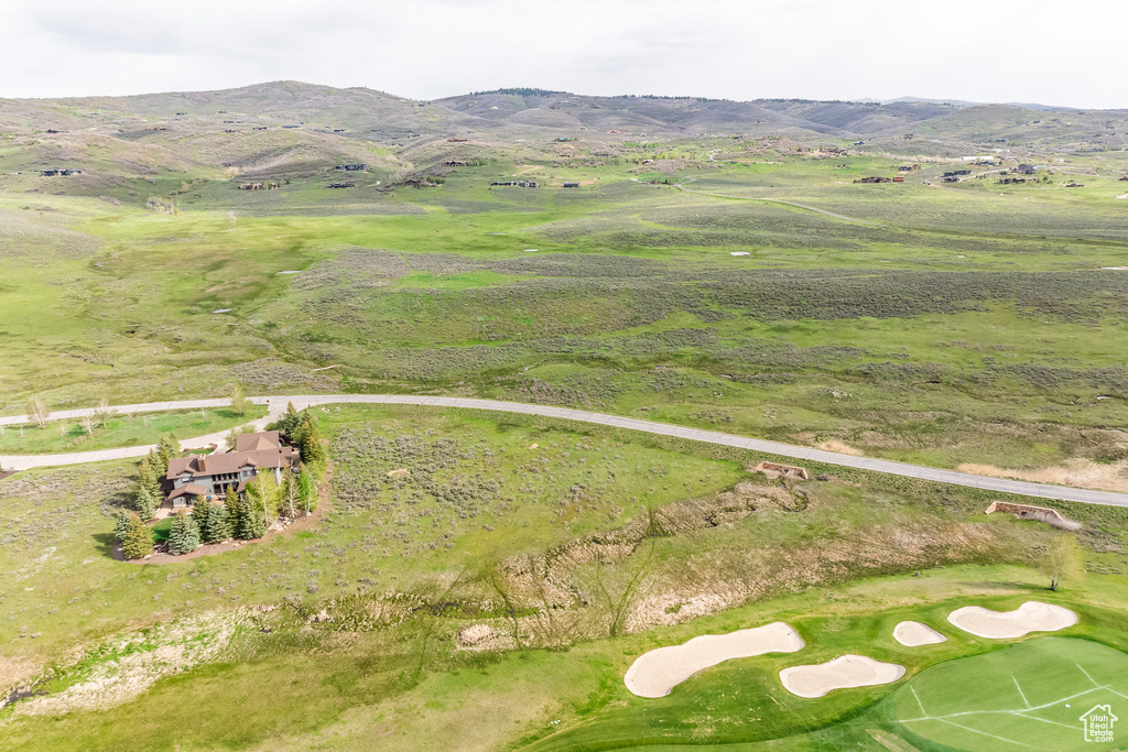 Aerial overview of property's location with mountains