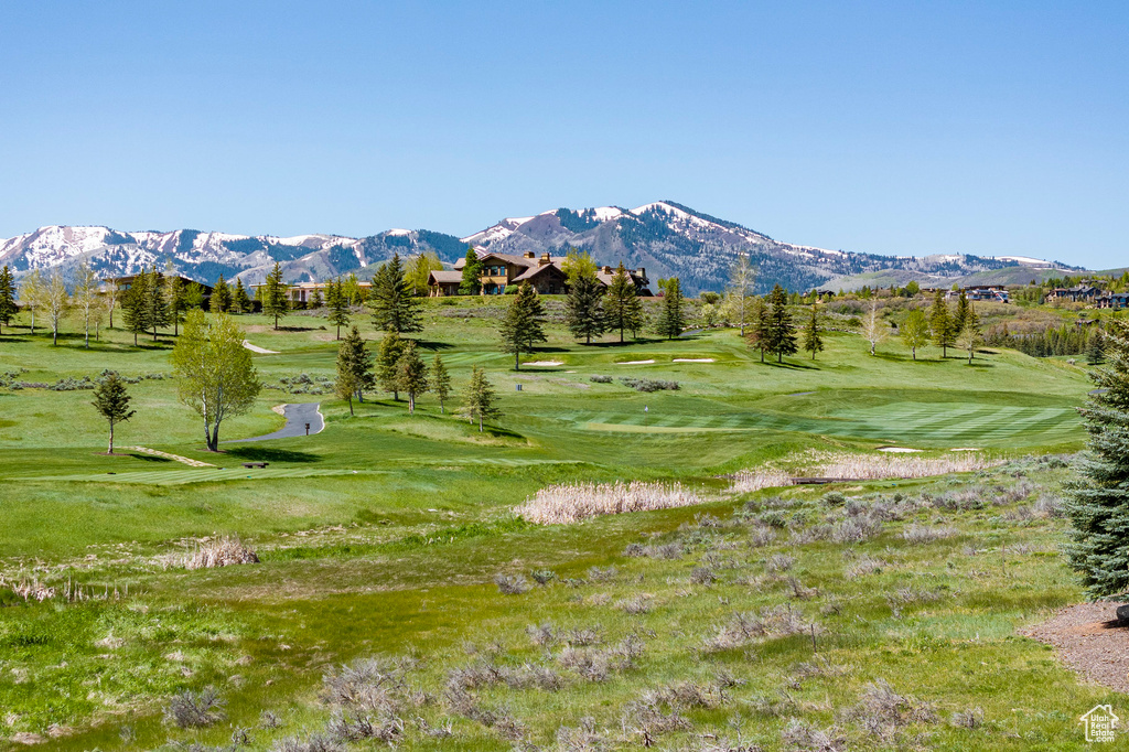 View of mountain background with a golf club