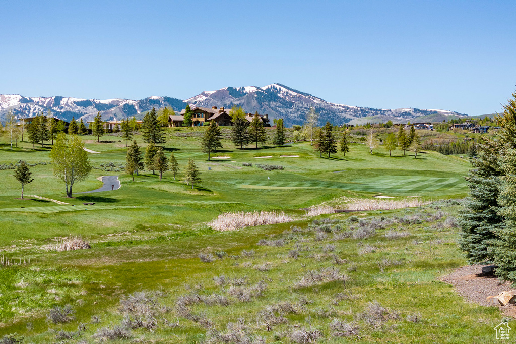 View of mountain backdrop featuring a golf course