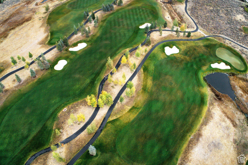Aerial overview of property's location featuring a golf course