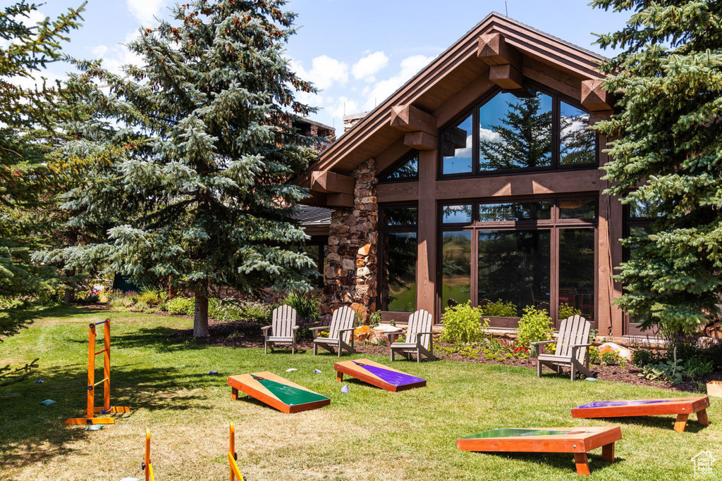View of home's community featuring a lawn