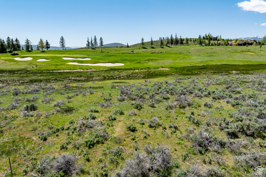 View of property's community featuring view of golf course and a mountain view