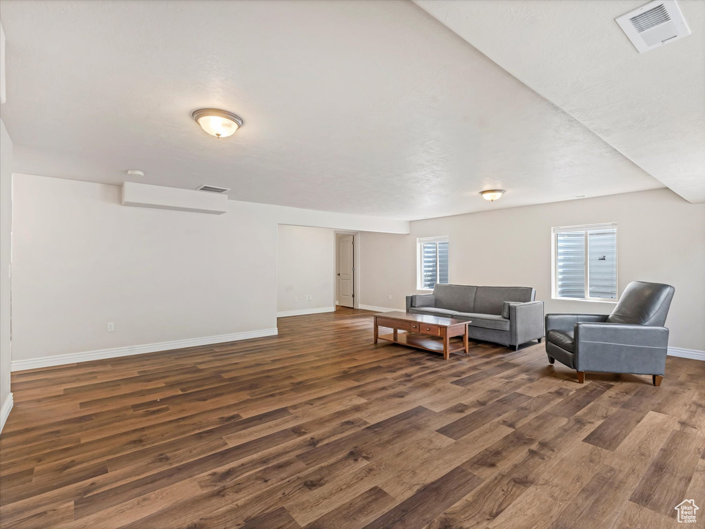 Living area featuring wood finished floors and baseboards