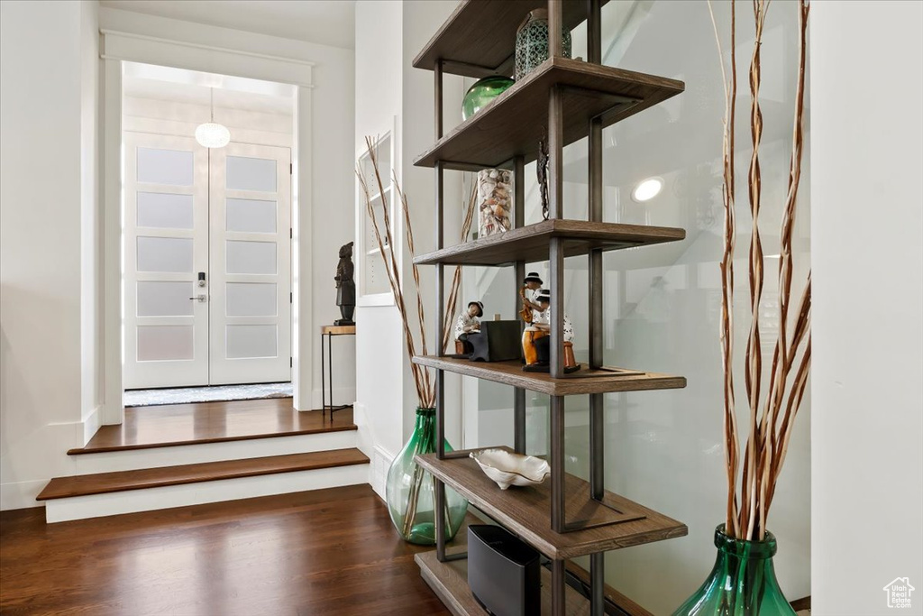 Foyer with wood finished floors