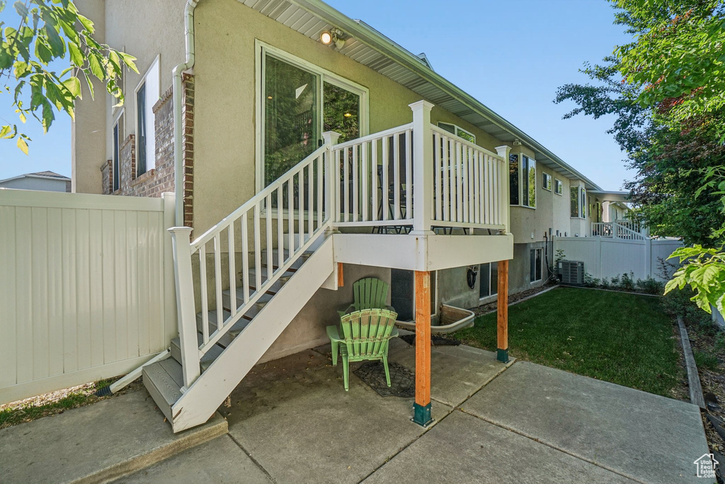 View of patio featuring cooling unit