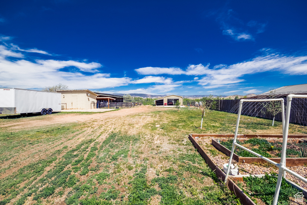View of yard with a vegetable garden