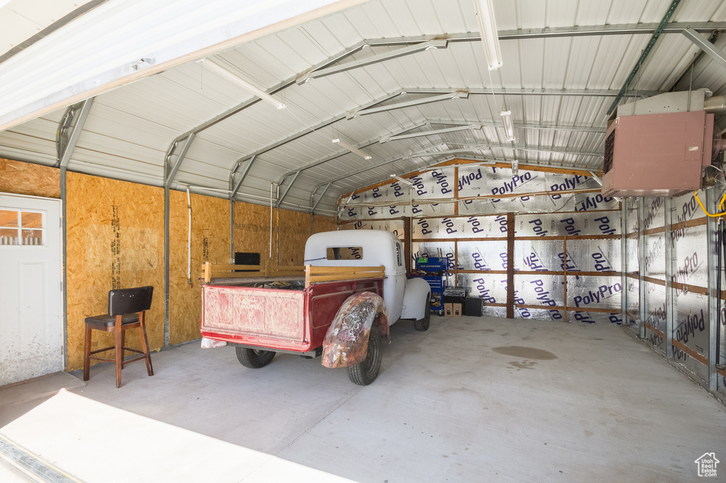 Garage featuring metal wall
