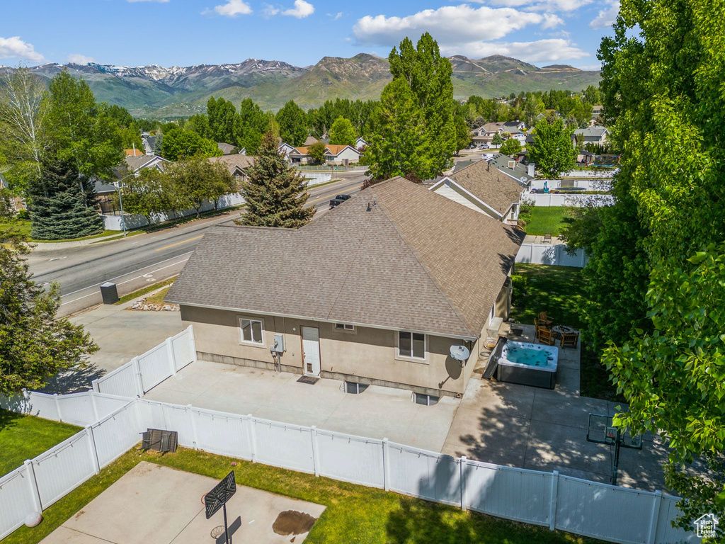 Aerial view of residential area with a mountainous background