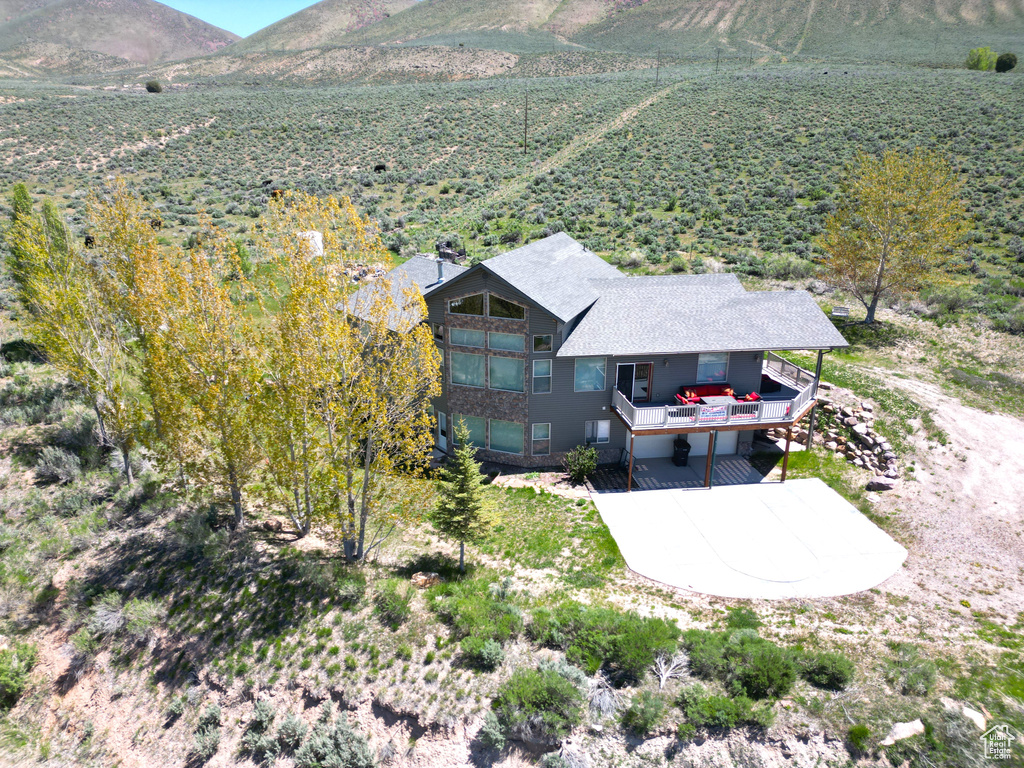 Overview of rural landscape with a mountain backdrop