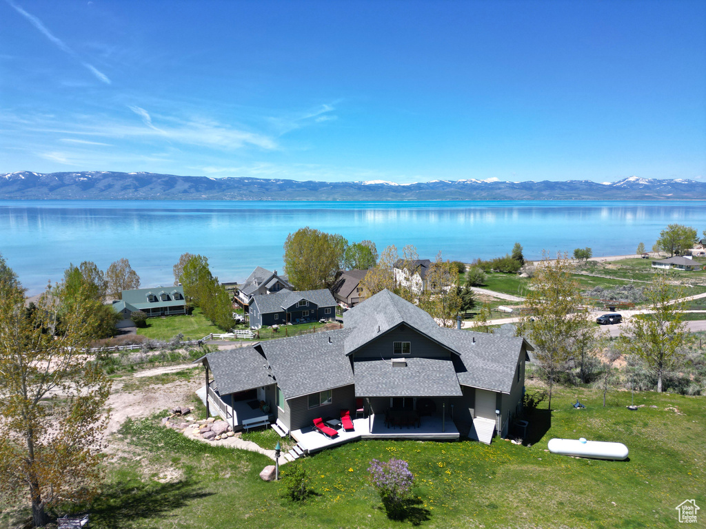 View from above of property featuring a water and mountain view