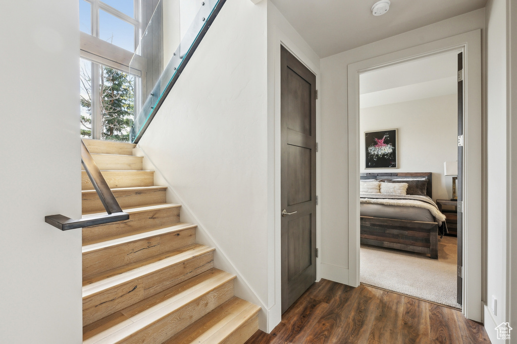 Stairway with wood finished floors