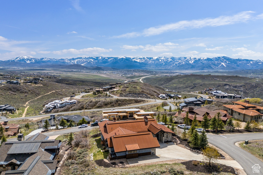 Drone / aerial view featuring a mountain view and a residential view