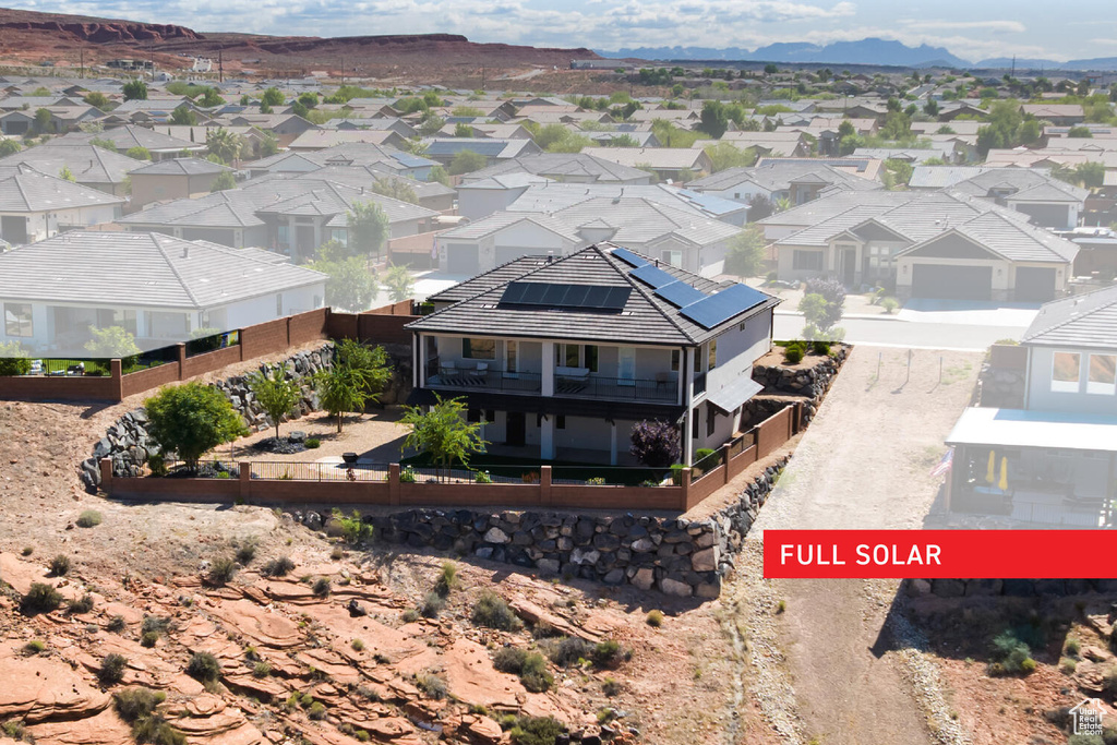 Aerial view of residential area with a mountain backdrop