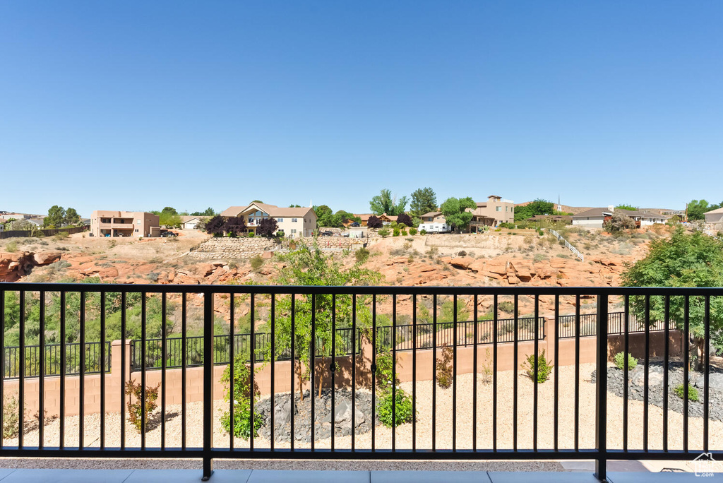Balcony featuring a residential view