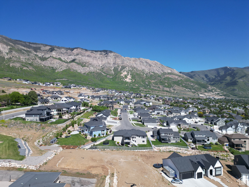 View of mountain backdrop featuring nearby suburban area