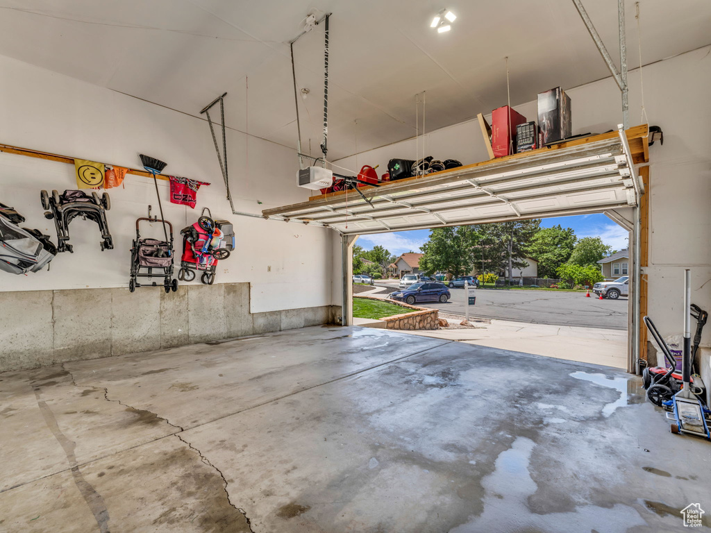 Garage featuring a garage door opener