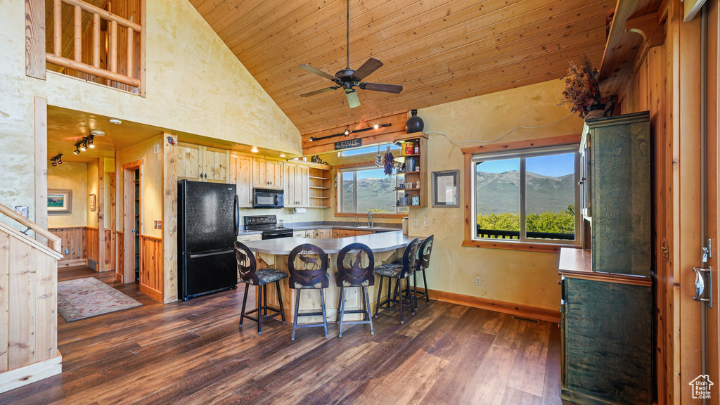 Kitchen featuring black appliances, open shelves, a sink, a peninsula, and wood ceiling