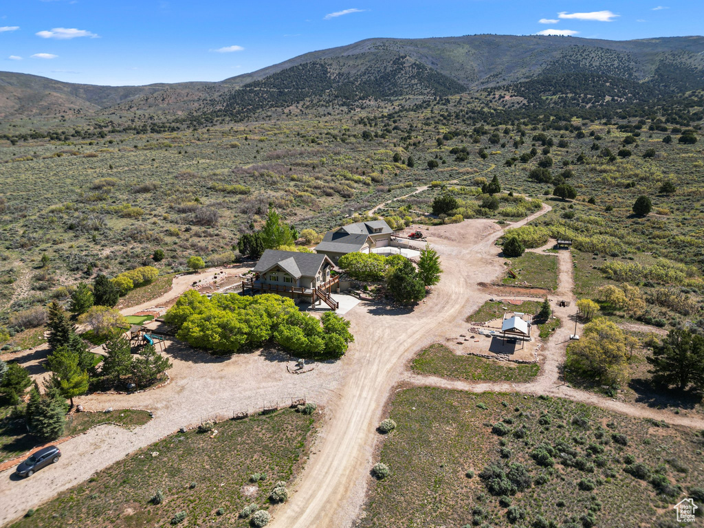 View from above of property featuring a mountainous background
