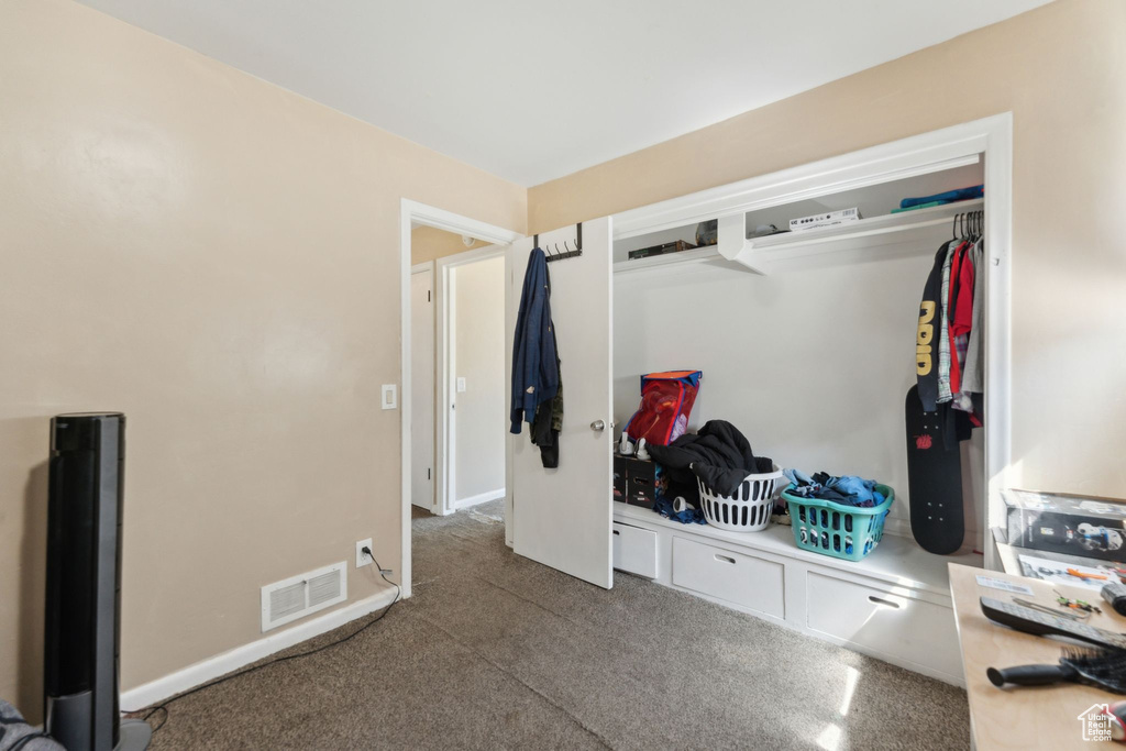 Bedroom with carpet flooring