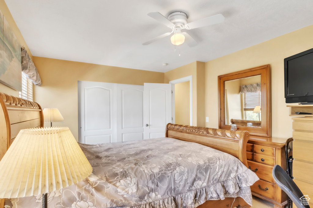 Bedroom featuring a closet and a ceiling fan