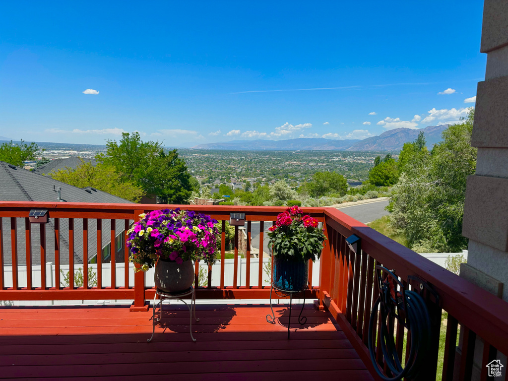 Wooden deck featuring a mountain view