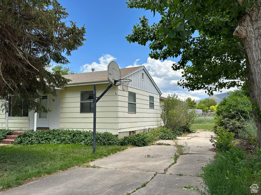 View of side of home with board and batten siding