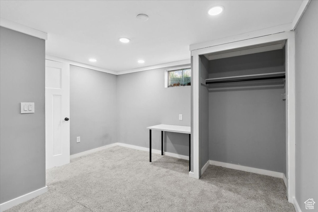 Unfurnished bedroom with carpet floors, recessed lighting, and baseboards